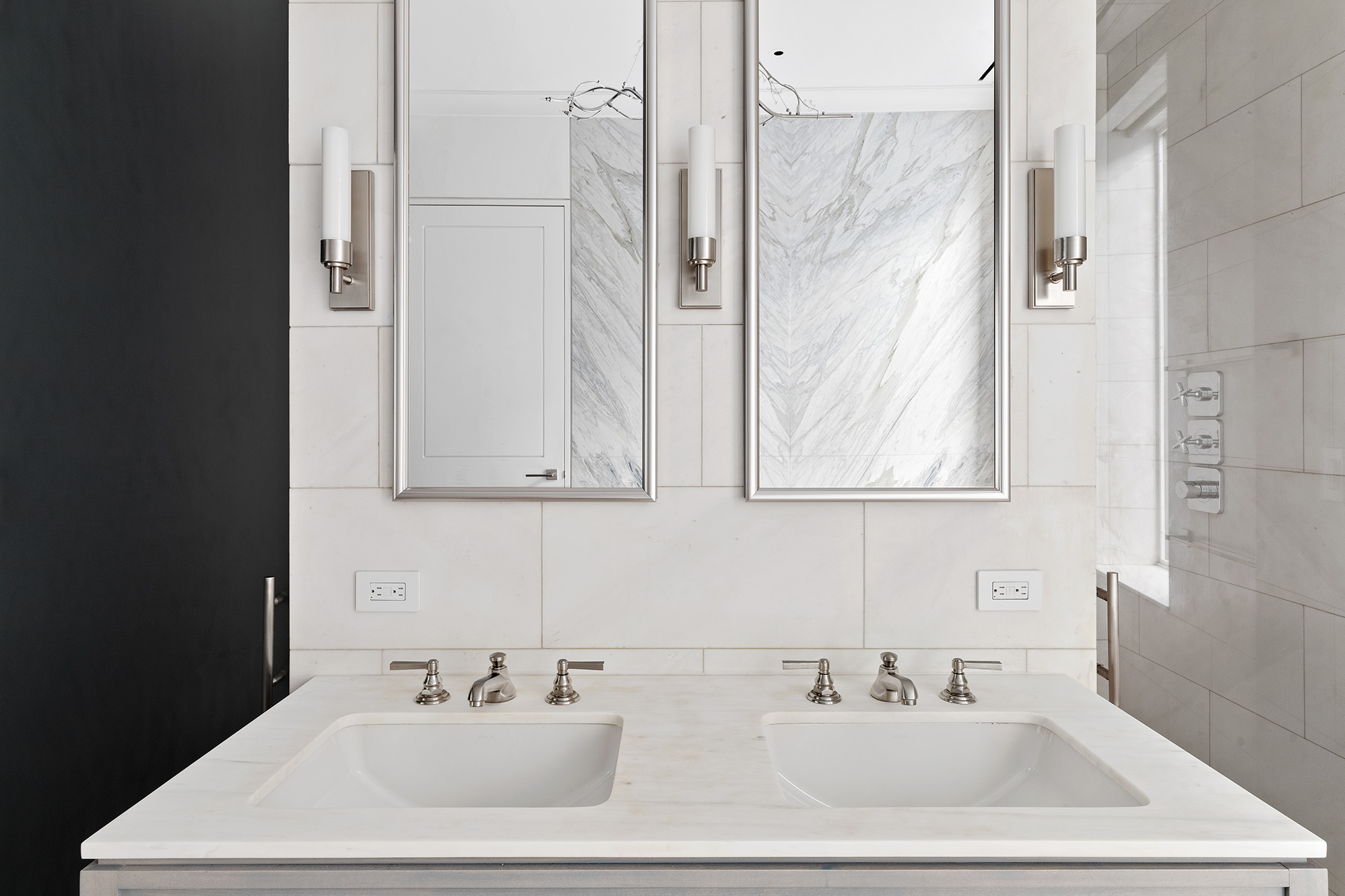 26 West 20th Street, Unit 3 Manhattan, NY 10011 - Photo 14 of 19 a bathroom with a sink and a mirror