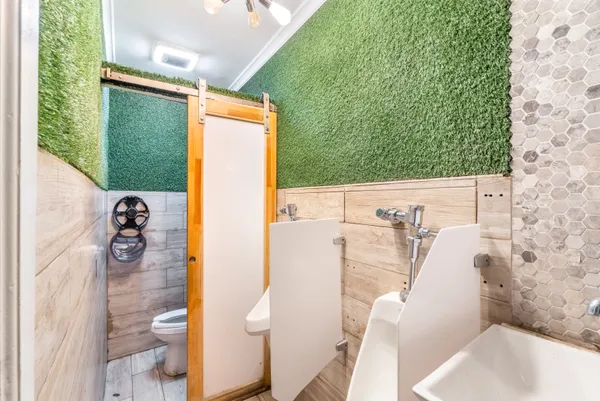 a view of swimming pool with seating space