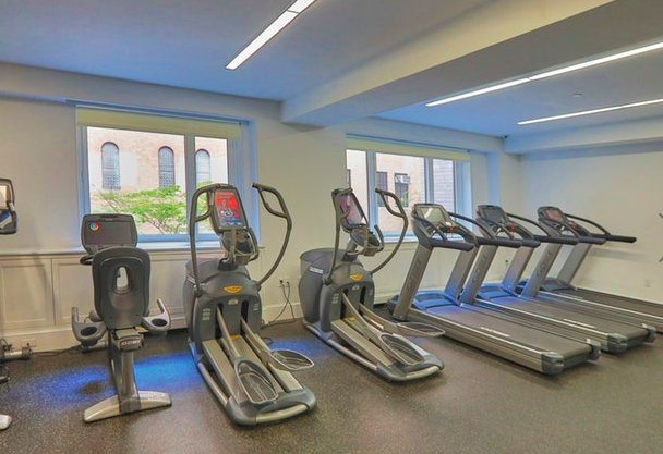 530 Park Avenue, Unit 12F Manhattan, NY 10065 - Photo 23 of 26 a view of a room with gym equipment
