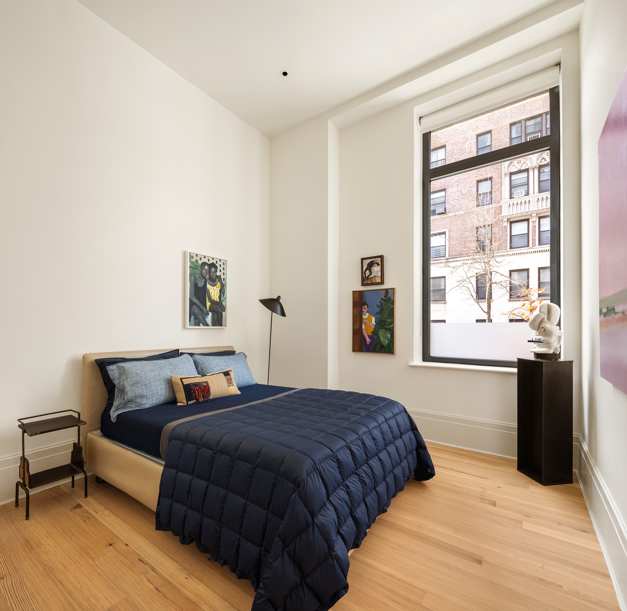 1 Prospect Park West, Unit 2B Brooklyn, NY 11215 - Photo 13 of 23 a bedroom with a large bed and a window