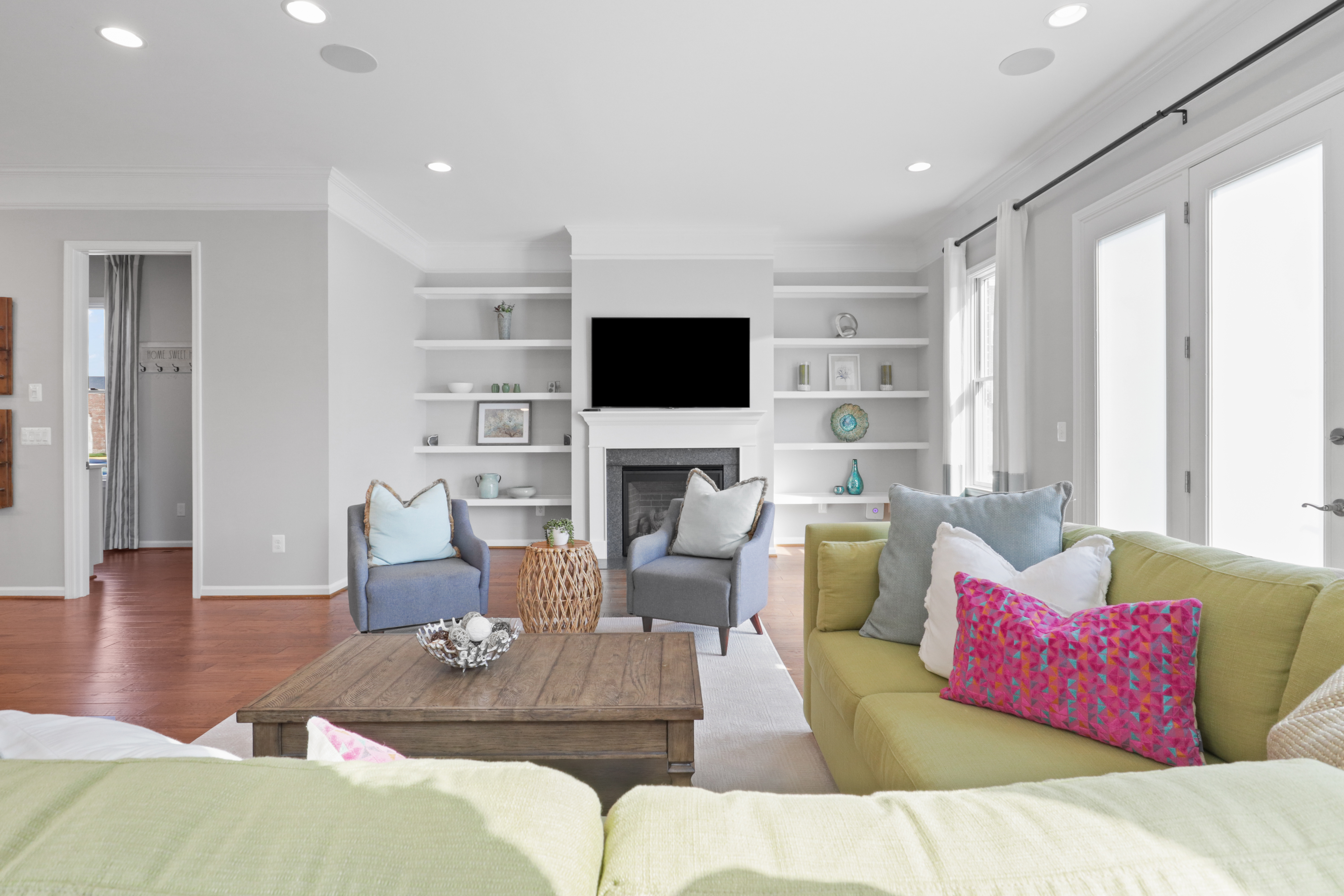 9101 Power House Road Lorton, VA 22079 - Photo 25 of 75 a living room with fireplace furniture and a flat screen tv