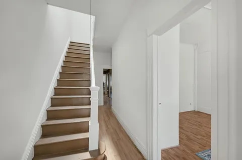 a view of an entryway with stairs