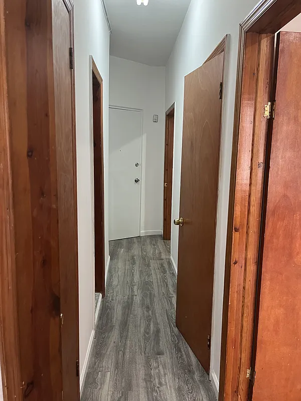 571 Nostrand Avenue, Unit 3R Brooklyn, NY 11216 - Photo 6 of 7 a view of hallway with wooden floor