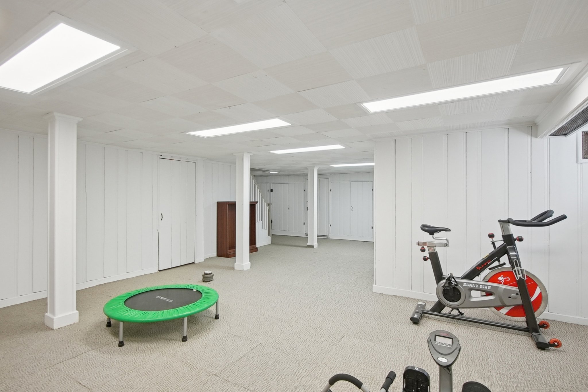 877 Ridgewood Road Millburn, NJ 07041 - Photo 27 of 37 a view of a room with gym equipment