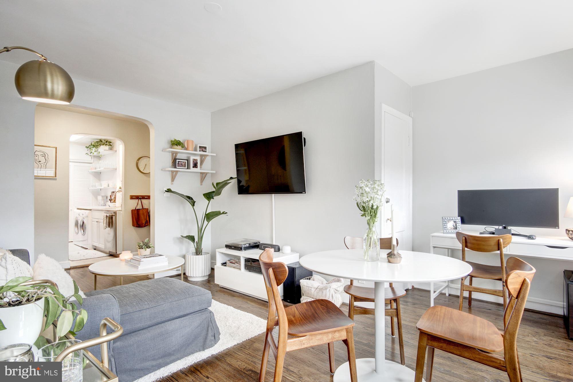 731 13th Street Northeast Washington, DC 20002 - Photo 9 of 43 a living room with furniture and a flat screen tv