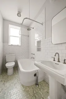 a bathroom with a sink and a bathtub