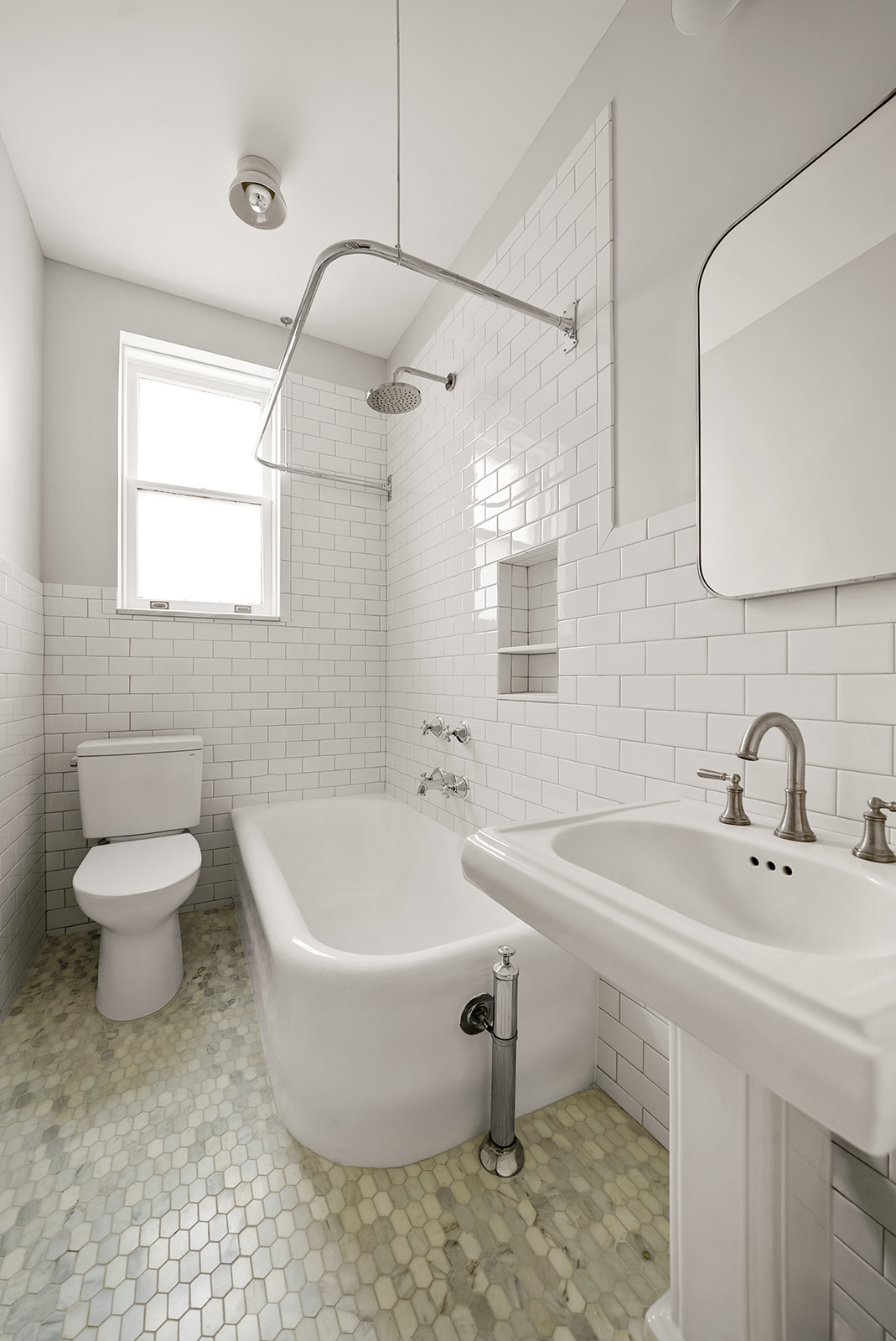 34-13 80th Street, Unit 31 Queens, NY 11372 - Photo 12 of 16 a bathroom with a sink and a bathtub