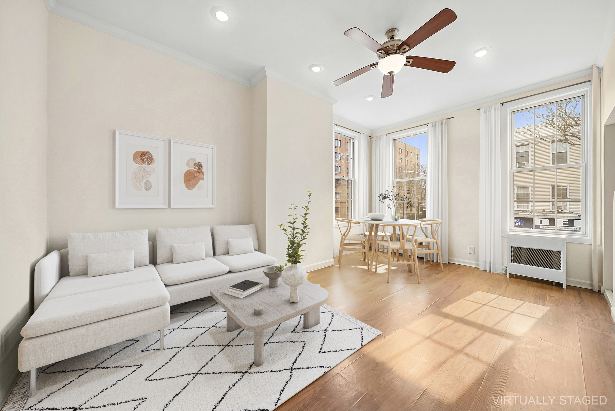 109 Moffat Street, Unit 2F Brooklyn, NY 11207 - Photo 1 of 8 a living room with furniture and a large window