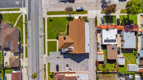 an aerial view of houses with outdoor space
