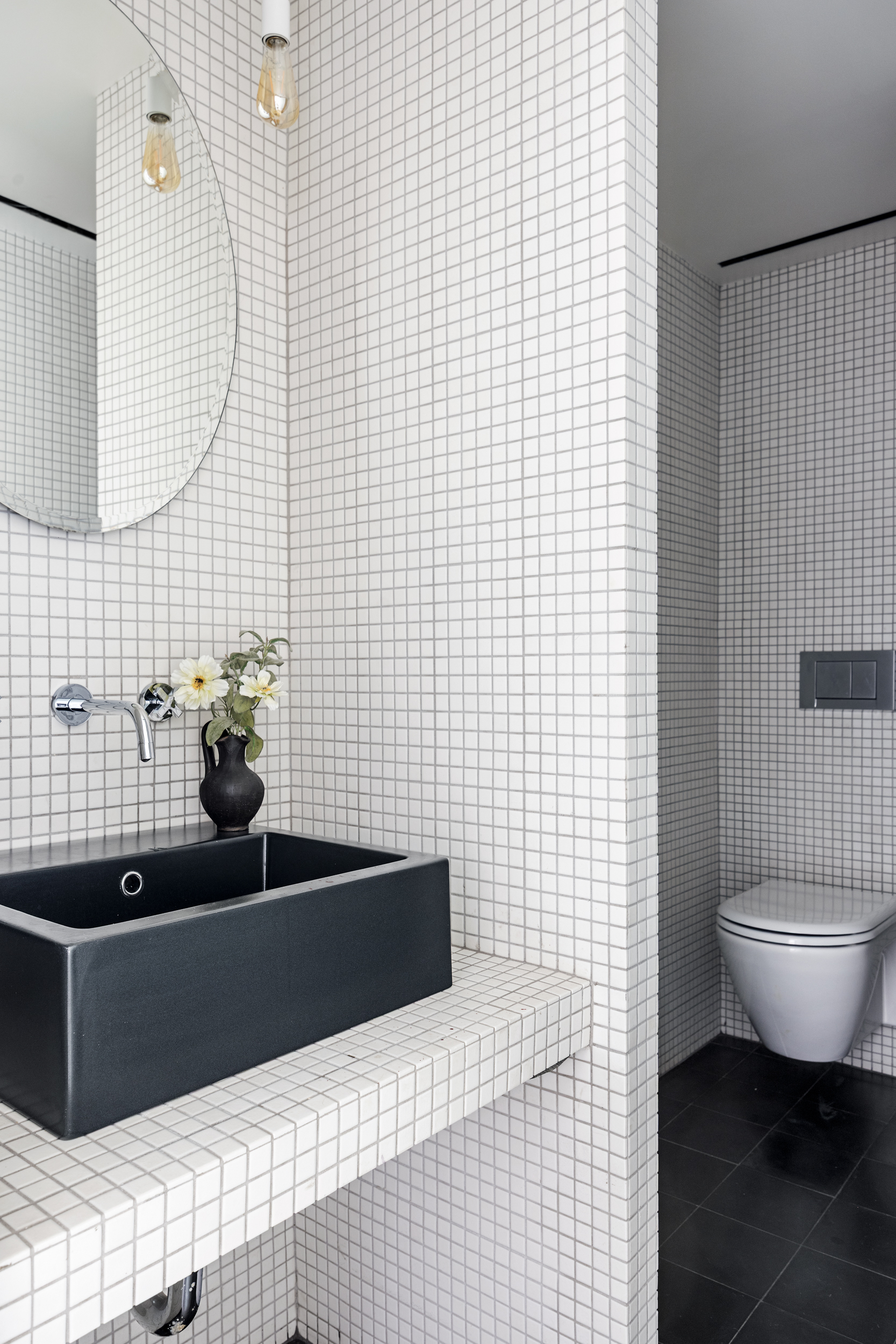 15 East 70th Street, Unit PHB Manhattan, NY 10021 - Photo 21 of 35 a bathroom with a sink a toilet and mirror