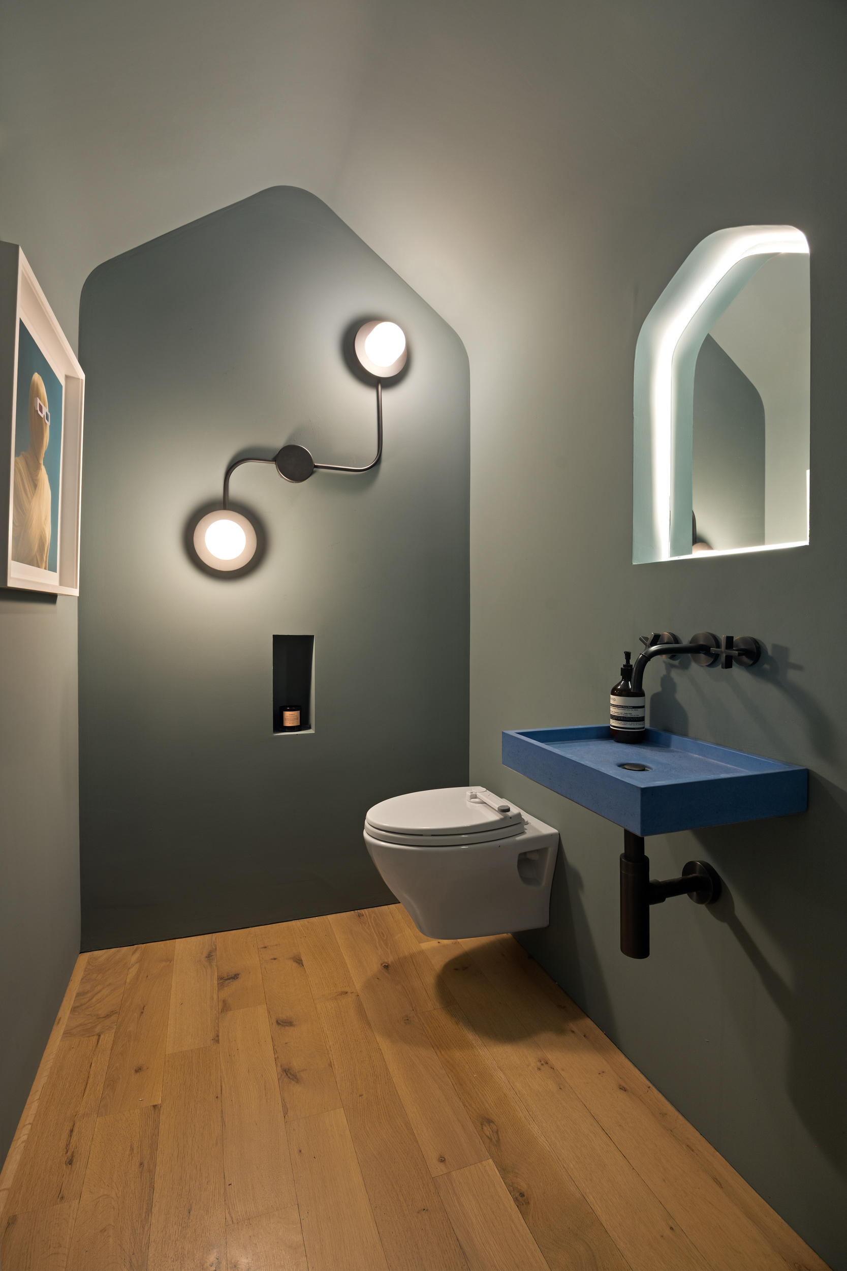 110 Duane Street, Unit PH3S Manhattan, NY 10007 - Photo 20 of 23 a bathroom with a sink a light fixture and a toilet