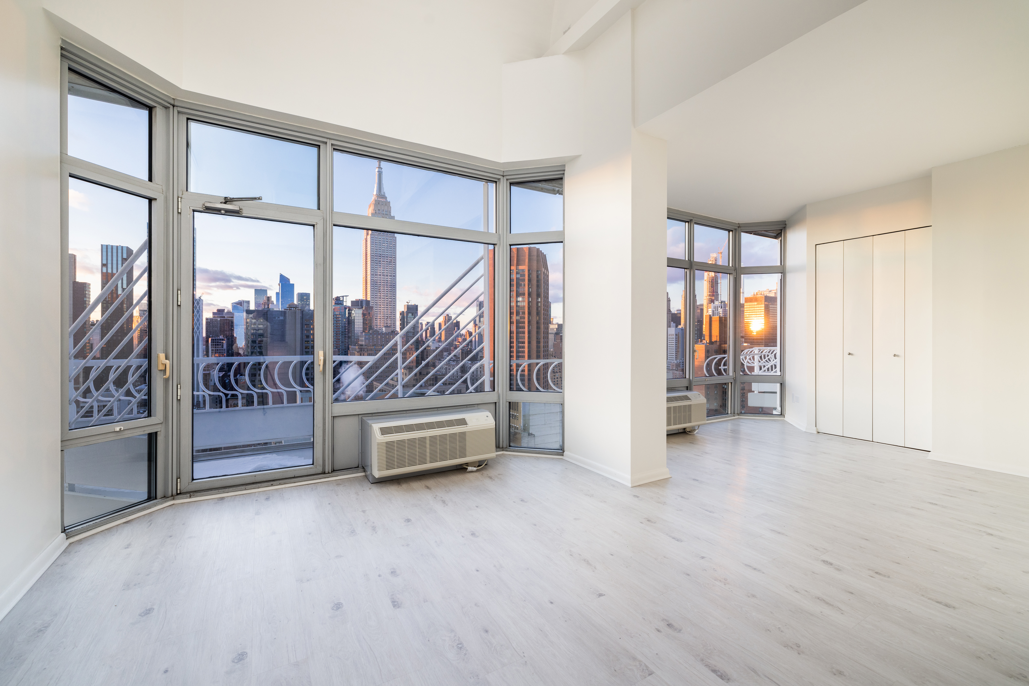 200 East 32nd Street, Unit 35C Manhattan, NY 10016 - Photo 3 of 26 an empty room with entrance and stairs