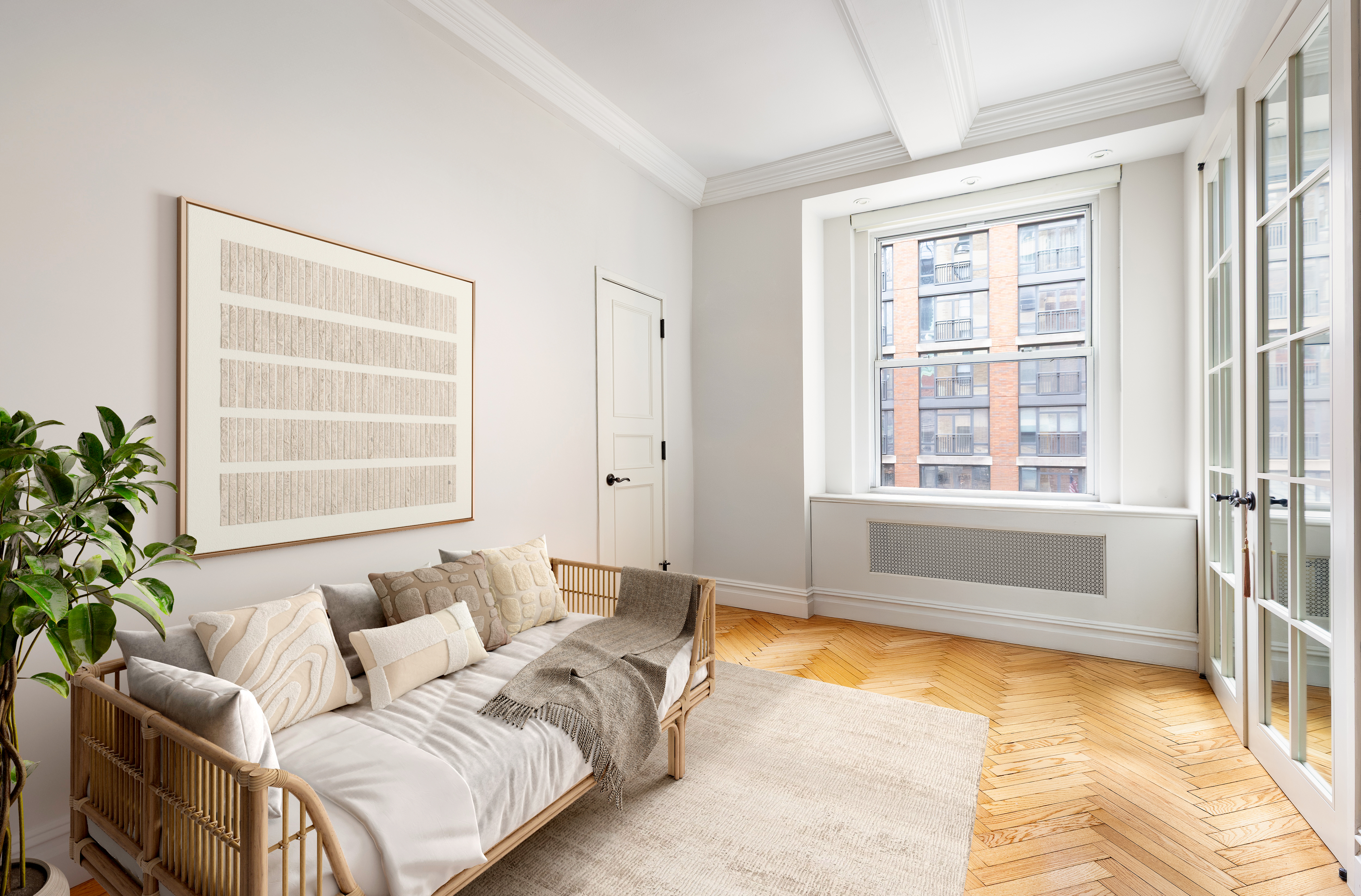 55 Park Avenue, Unit 9E Manhattan, NY 10016 - Photo 5 of 9 a living room with furniture and windows