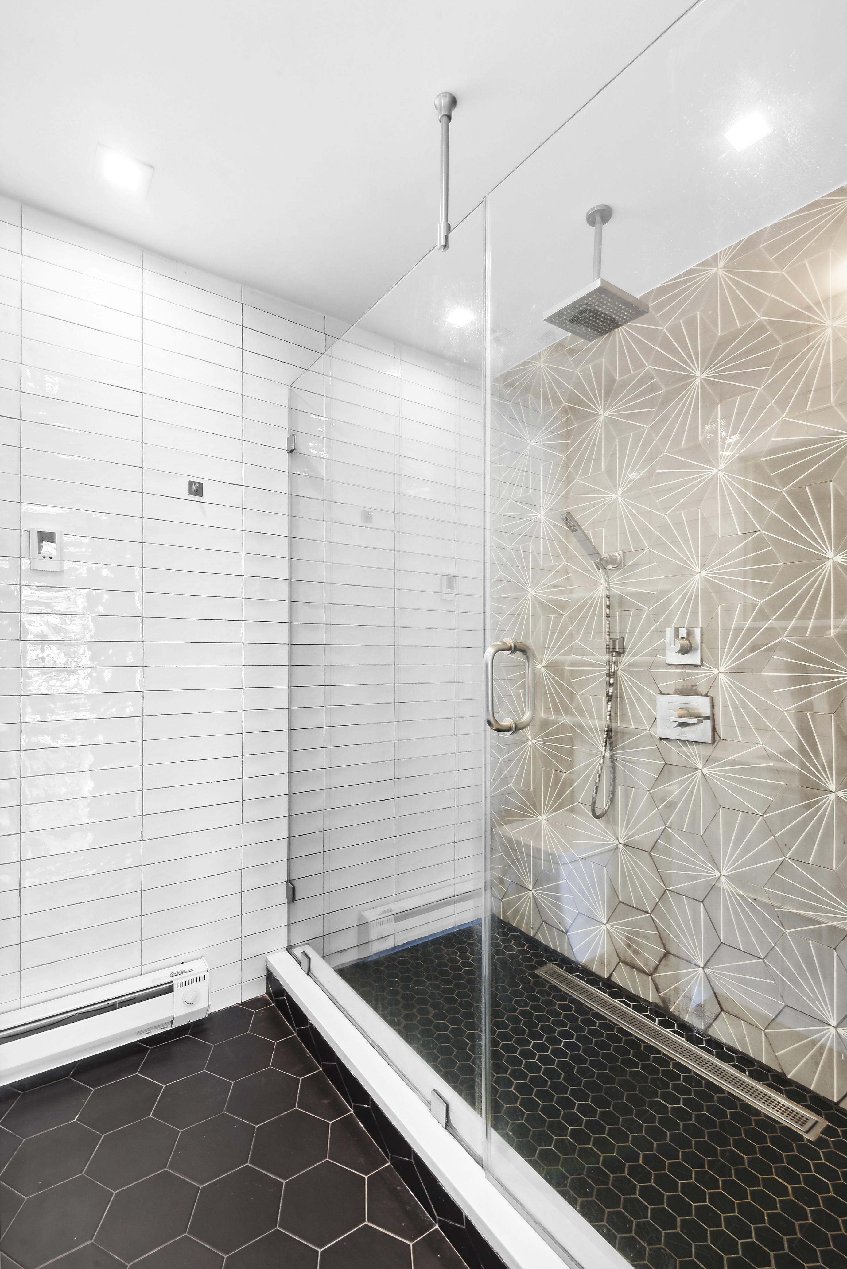 27 Dodworth Street, Unit PHF Brooklyn, NY 11221 - Photo 14 of 18 a bathroom with a bathtub