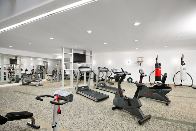 55 Berry Street, Unit 4B Brooklyn, NY 11249 - Photo 9 of 12 a view of a room with gym equipment