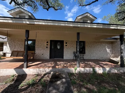 a view of a brick house with front door