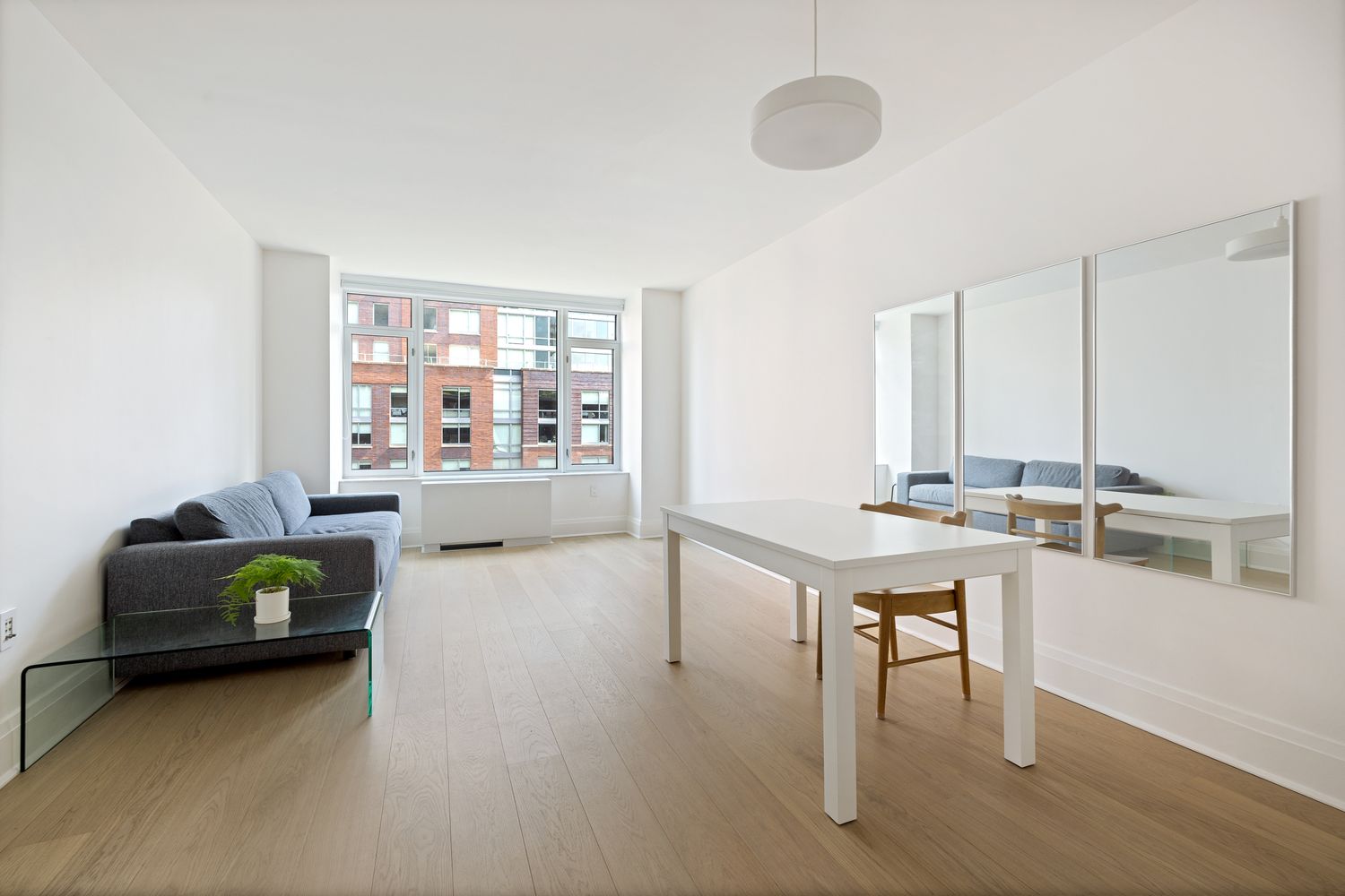 a living room with furniture and window