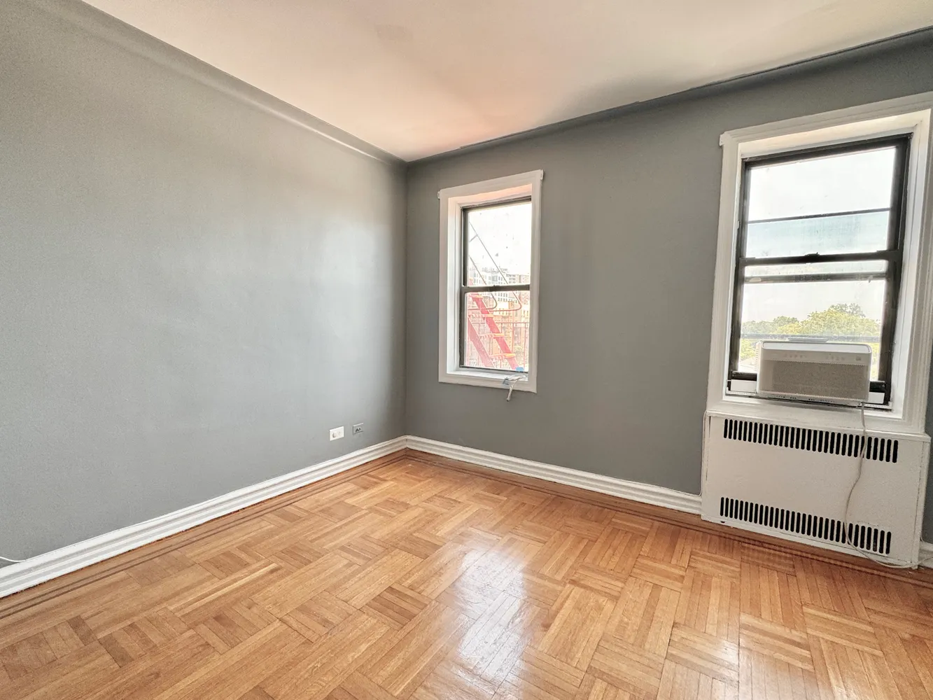 a view of an empty room with a window