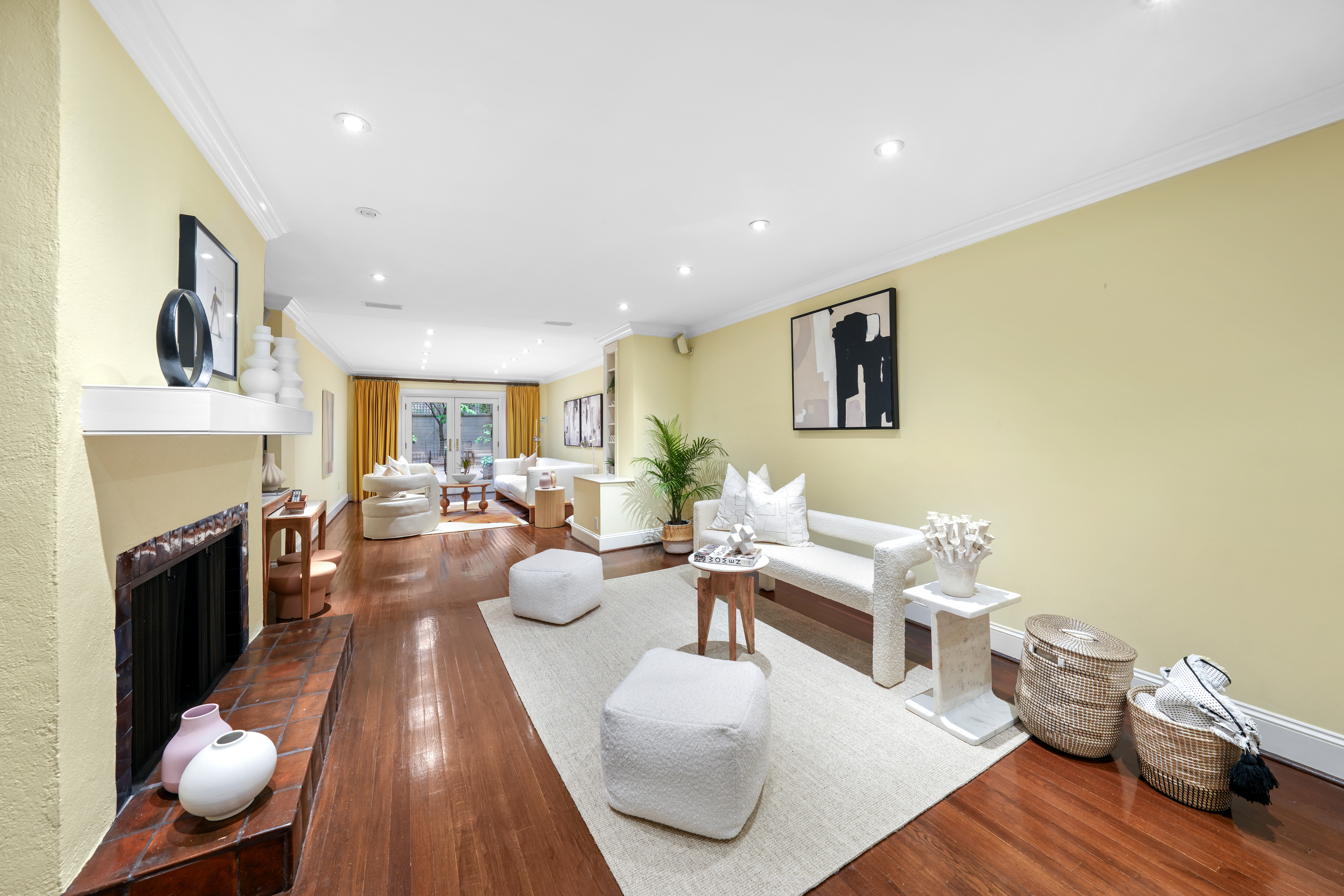 247 East 71st Street Manhattan, NY 10021 - Photo 5 of 31 a living room with furniture and a fireplace