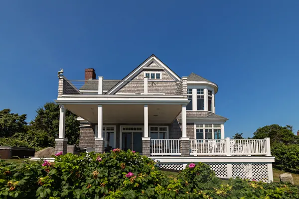 front view of a house with a small yard