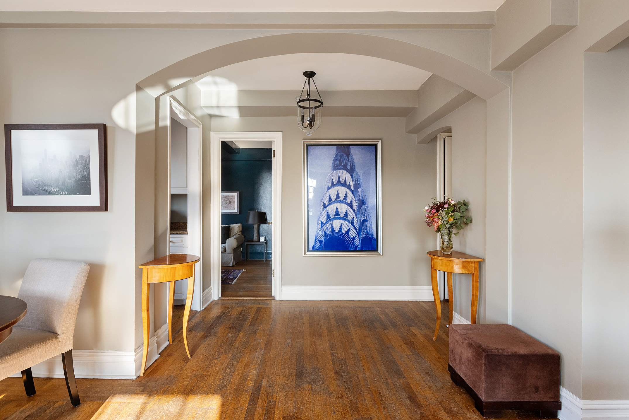 81 Irving Place, Unit 15DE Manhattan, NY 10003 - Photo 8 of 18 a view of a hallway with wooden floor and furniture