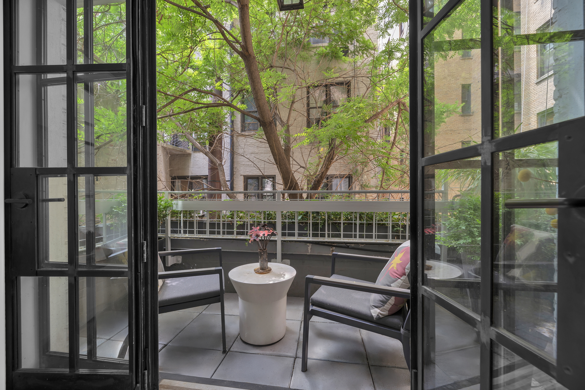 330 West End Avenue, Unit 2B Manhattan, NY 10023 - Photo 3 of 14 a view of a chairs and table in the balcony
