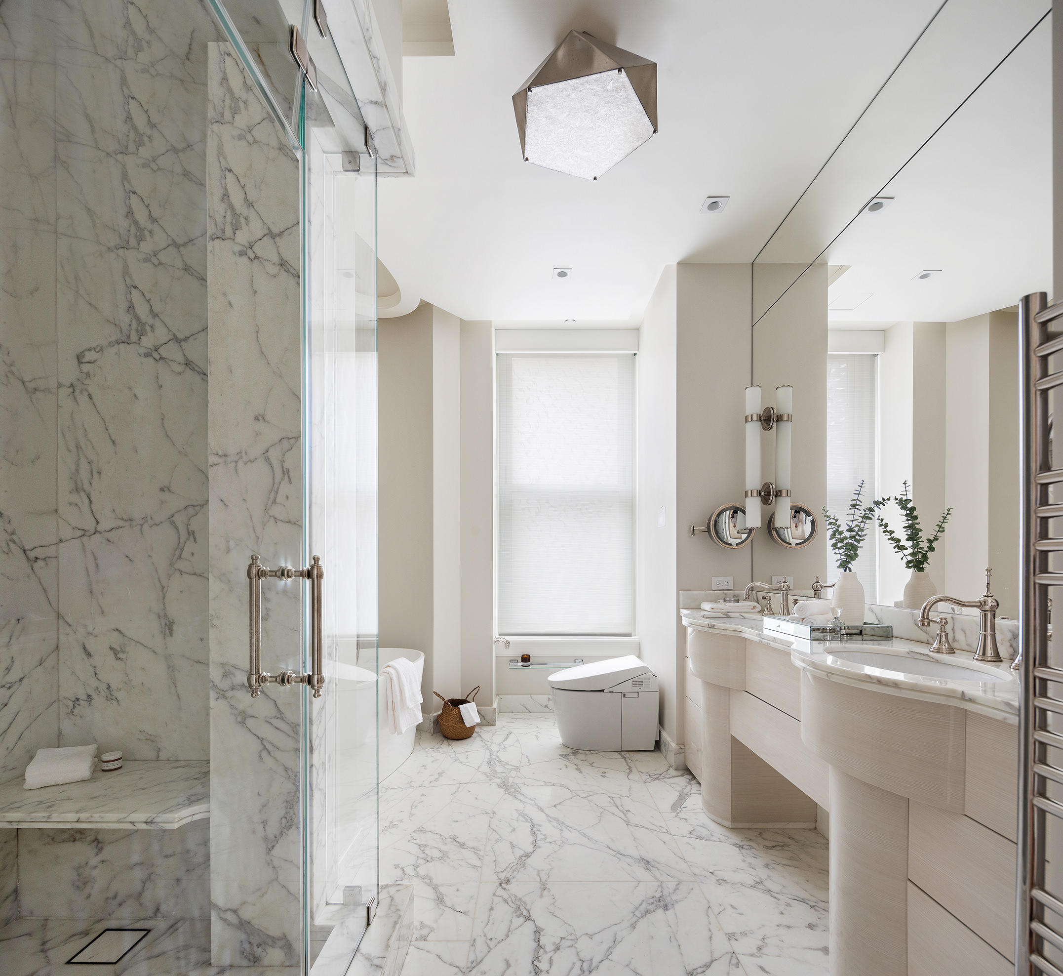 1 Central Park South, Unit 8010203 Manhattan, NY 10019 - Photo 16 of 45 a bathroom with a double vanity sink toilet and shower