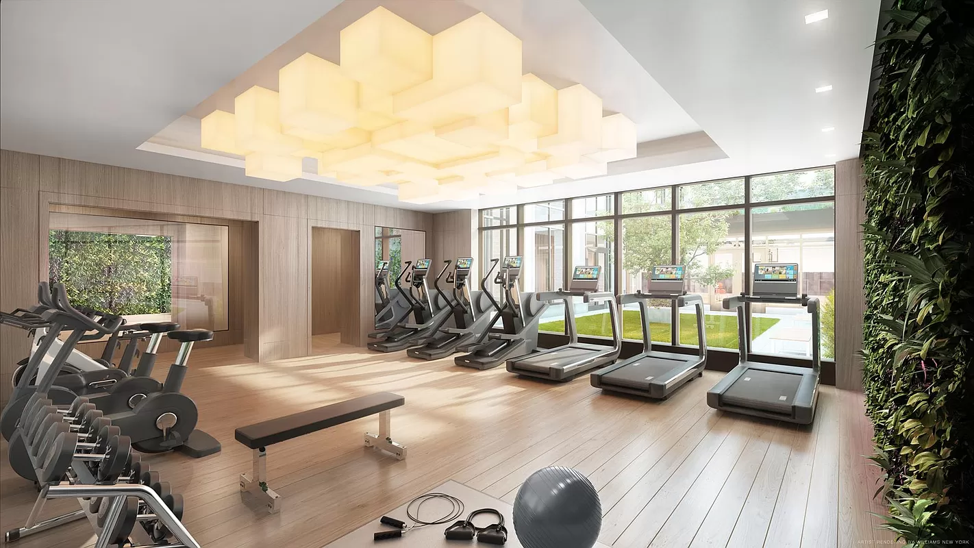 269 West 87th Street, Unit 7B Manhattan, NY 10024 - Photo 19 of 21 a room with gym equipment and large windows
