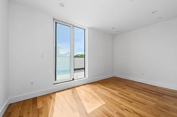 18 A Bleecker Street, Unit 4B Brooklyn, NY 11221 - Photo 7 of 11 an empty room with window