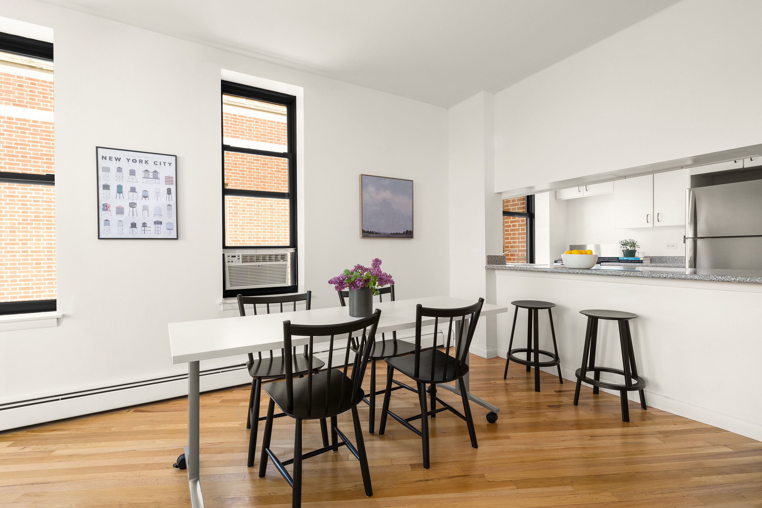 115 Eastern Parkway, Unit 6F Brooklyn, NY 11238 - Photo 3 of 11 a view of a dining room with furniture and wooden floor