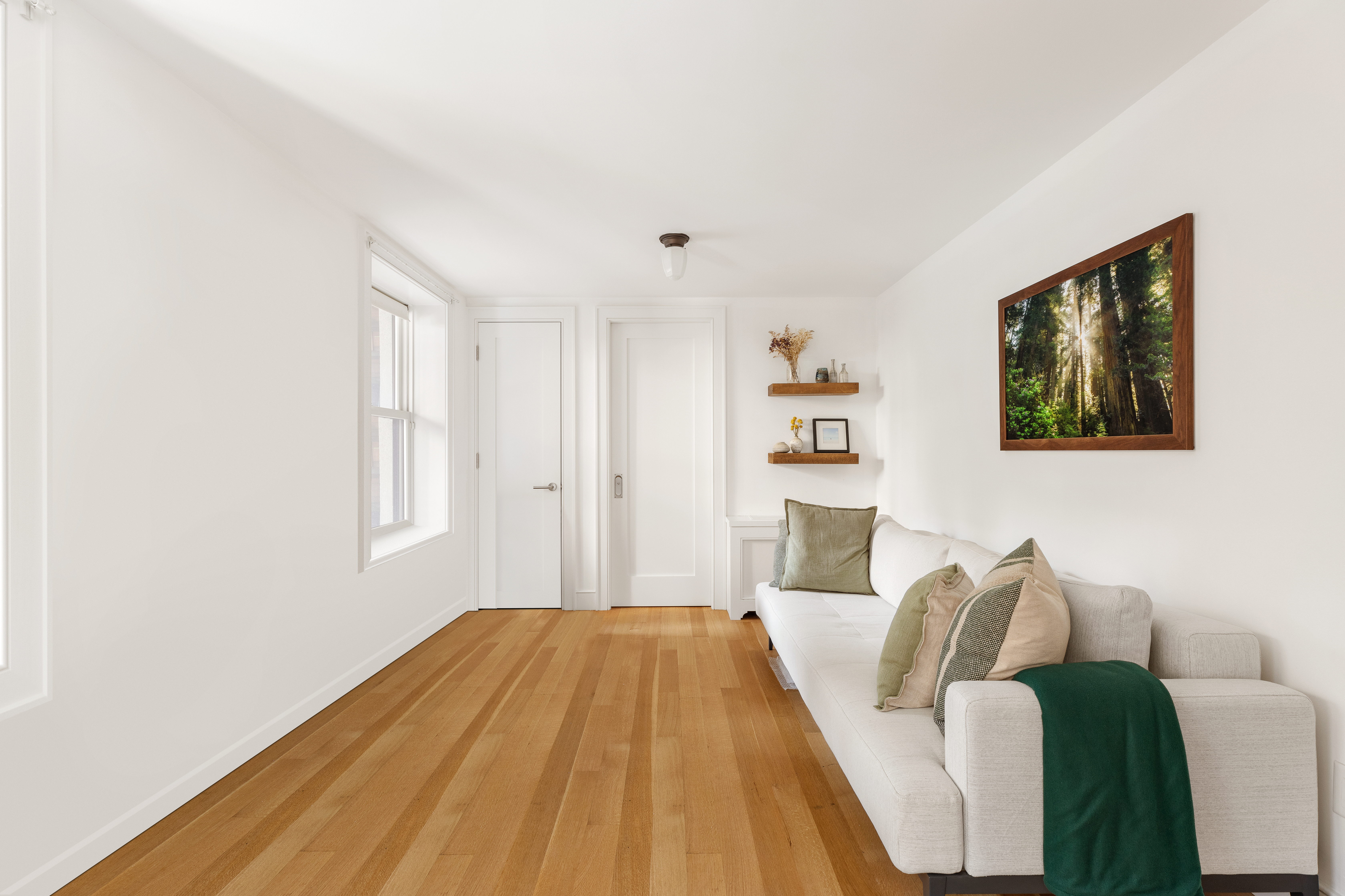 6 Strong Place, Unit GARDEN Brooklyn, NY 11231 - Photo 7 of 10 a bedroom with a bed and a couch