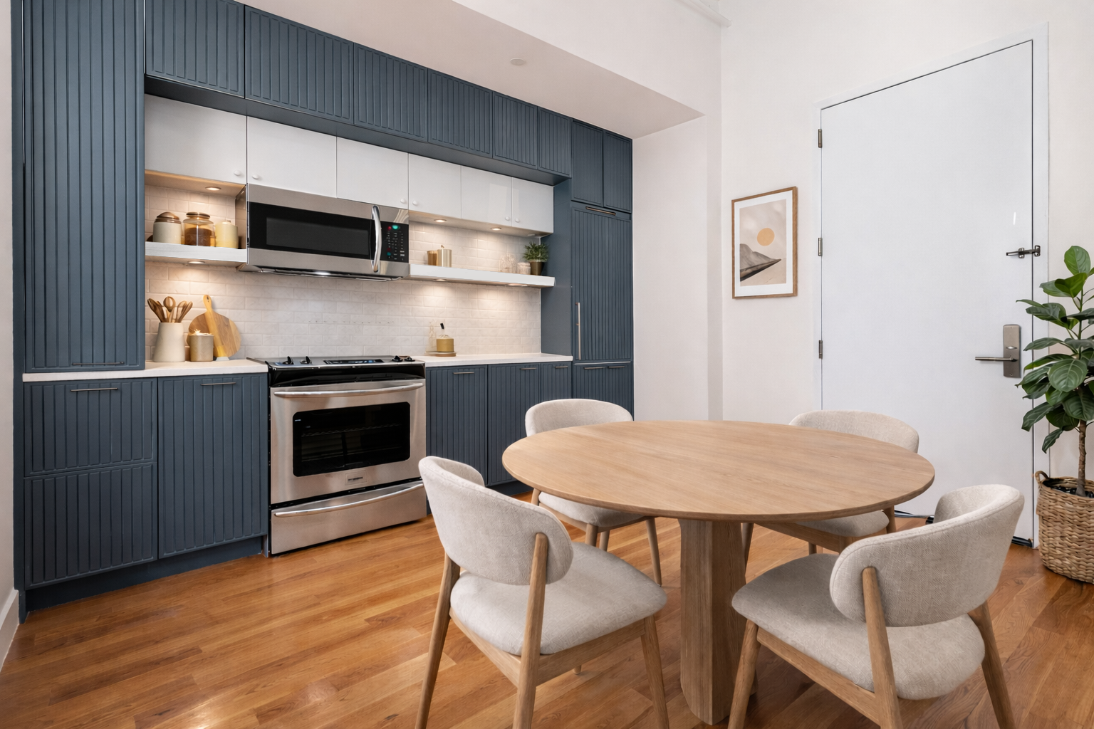 180 Bainbridge Street, Unit 110 Brooklyn, NY 11233 - Photo 4 of 23 a view of a dining room with furniture and wooden floor