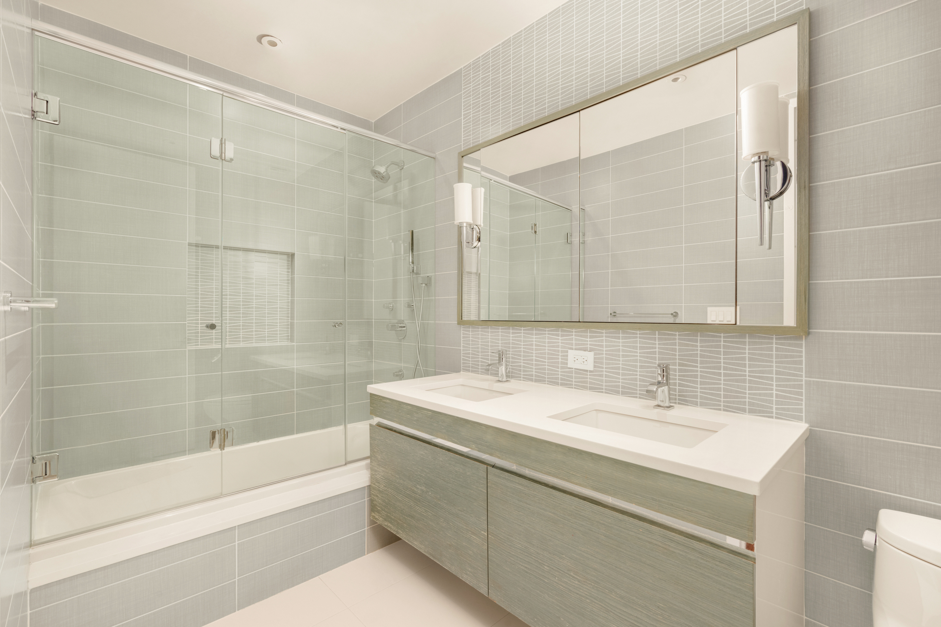 60 Beach Street, Unit 3C Manhattan, NY 10013 - Photo 9 of 12 a bathroom with a sink and a mirror