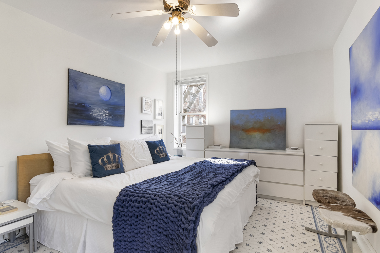 35-50 75th Street, Unit 5G Queens, NY 11372 - Photo 5 of 8 a bedroom with bed and a flat screen tv