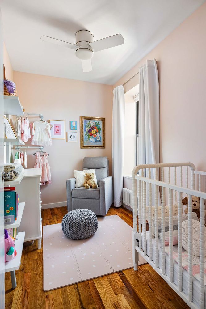 a bedroom with furniture and a rug