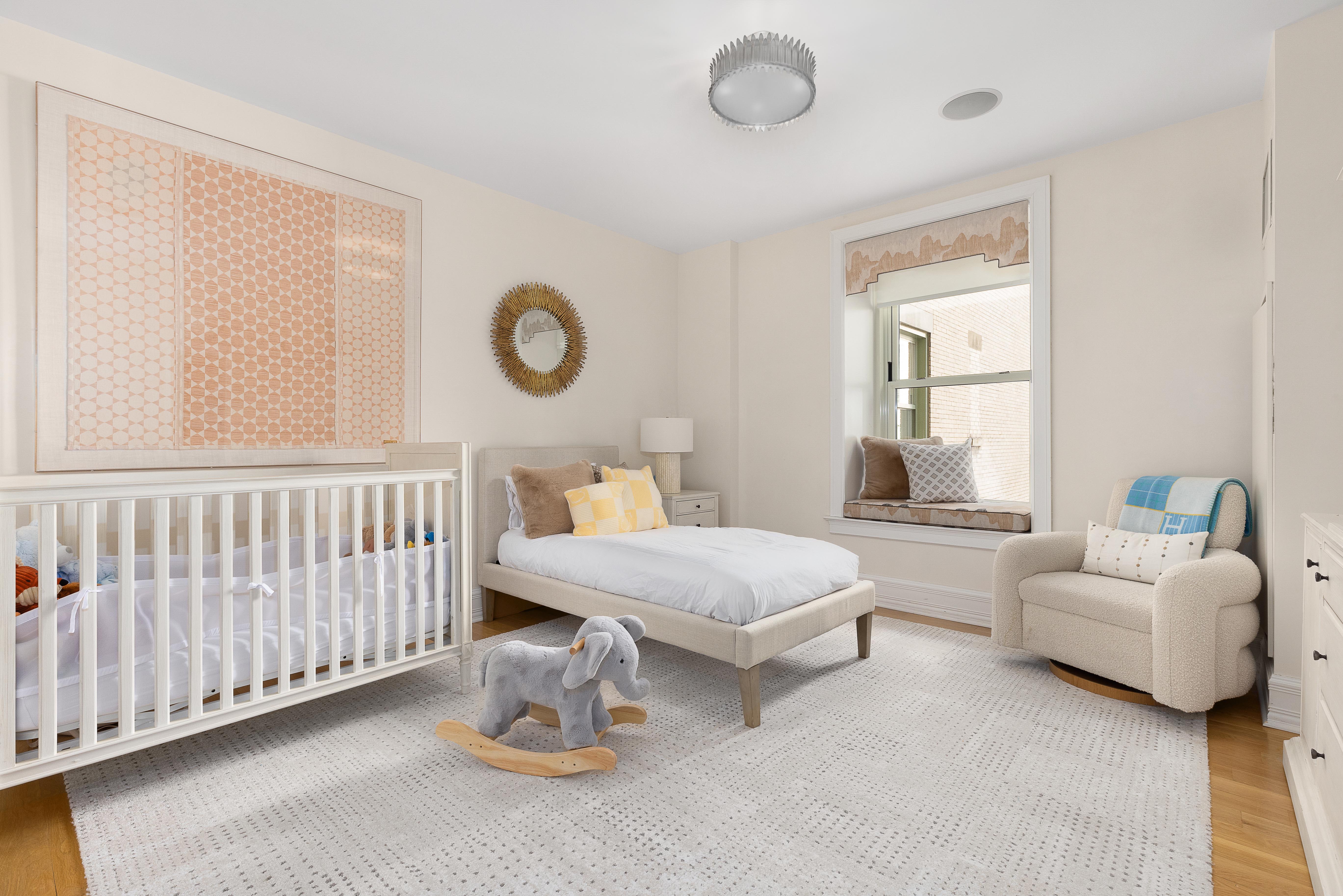 1 Central Park South, Unit 1513 Manhattan, NY 10019 - Photo 11 of 29 a bedroom with furniture and a window