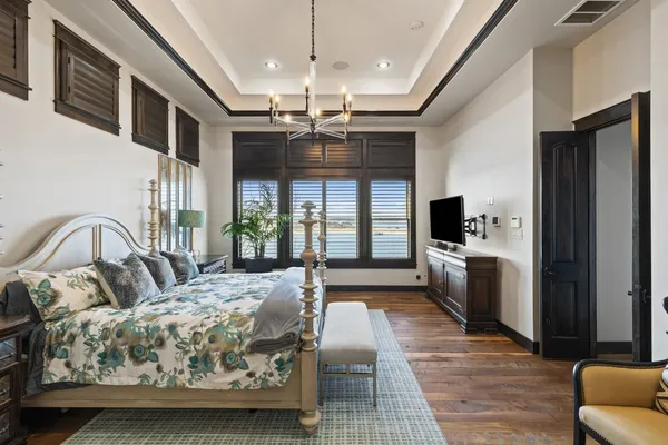 a living room with furniture fireplace and flat screen tv