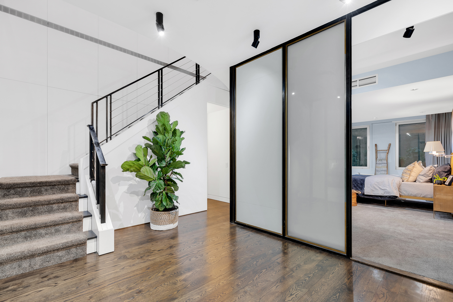200 Mercer Street, Unit MAIS-G Manhattan, NY 10012 - Photo 8 of 17 a view of entryway with livingroom and wooden floor
