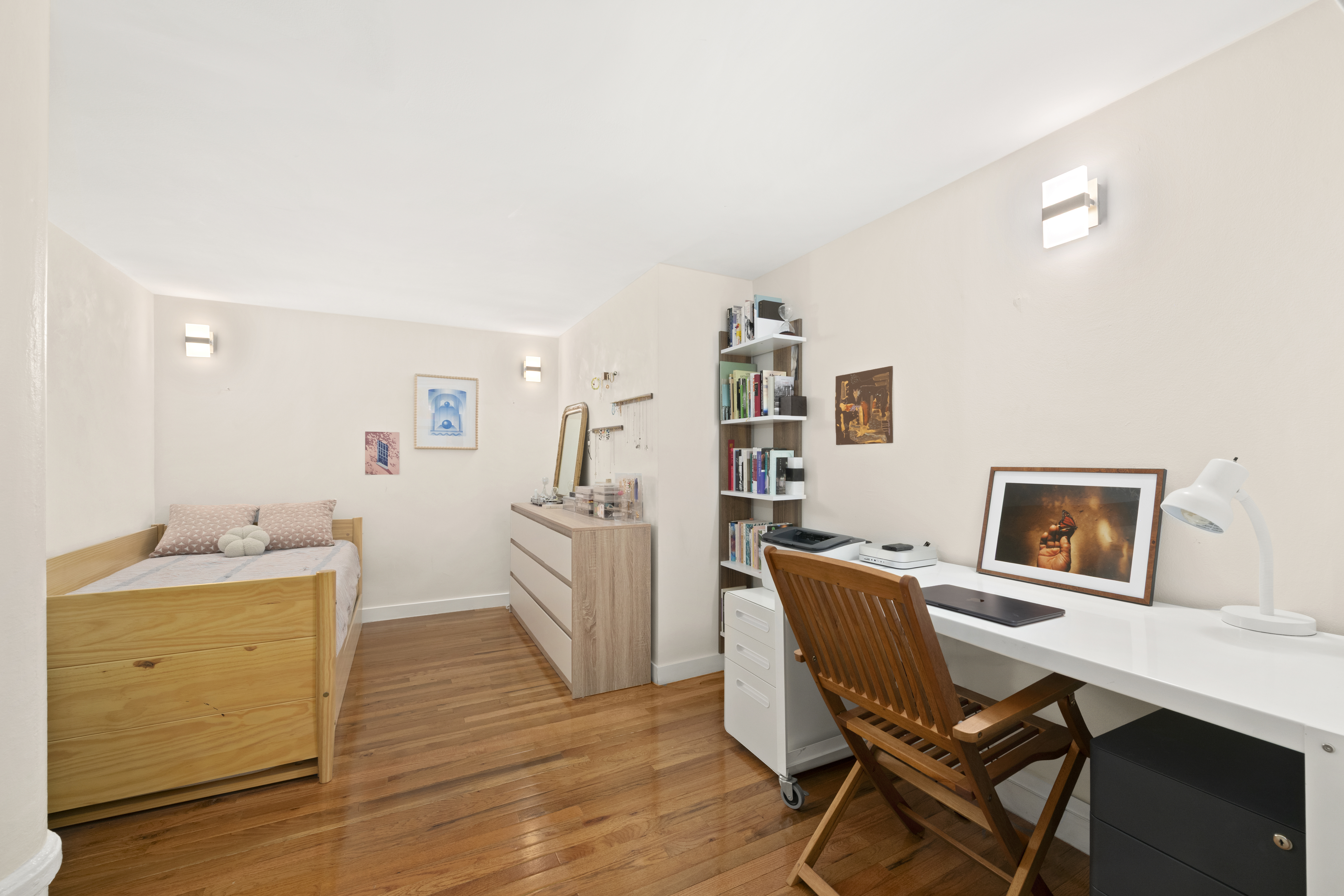 309 East 108th Street, Unit 2/D Manhattan, NY 10029 - Photo 11 of 12 a living room with furniture and wooden floor