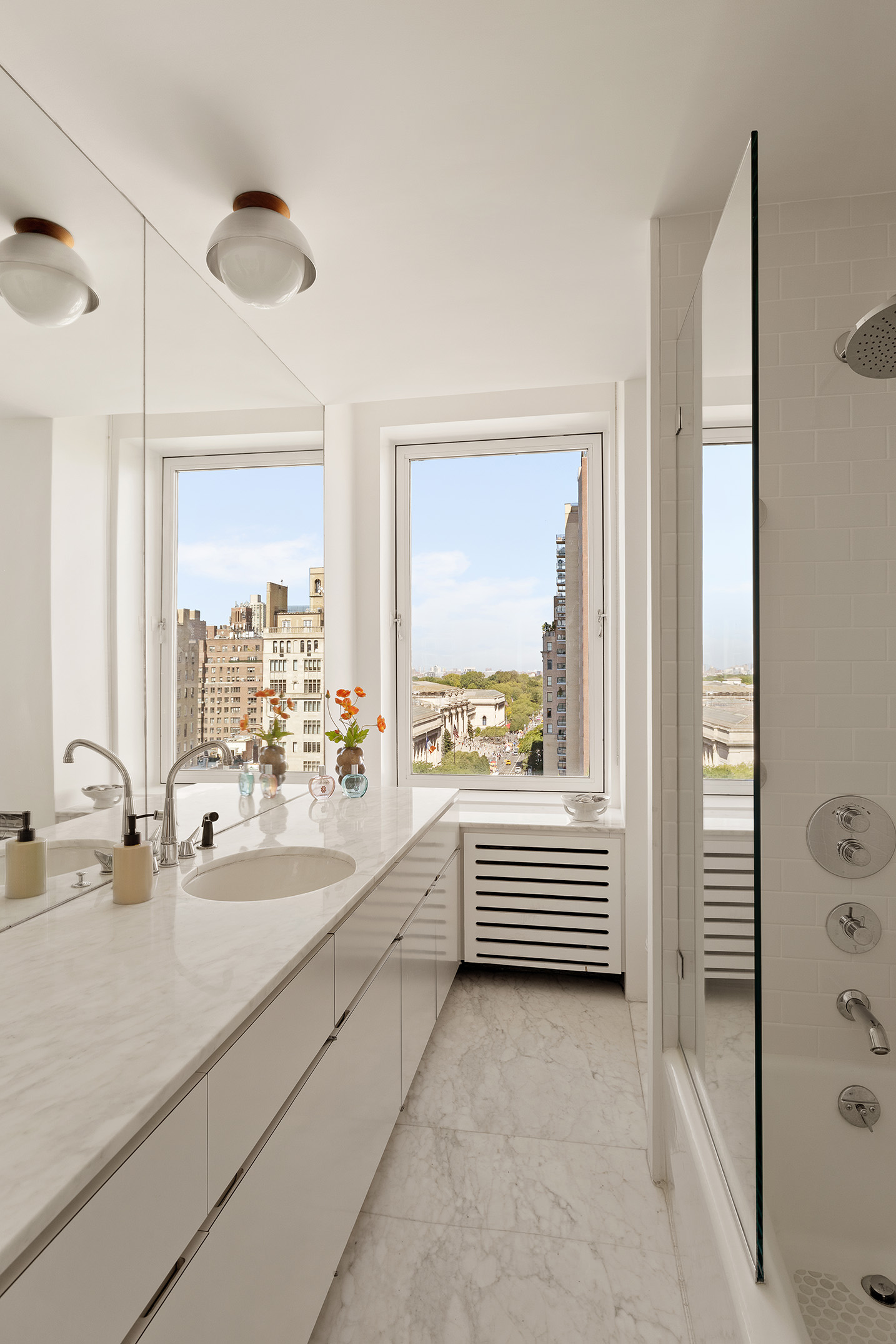 969 5th Avenue, Unit 14 Manhattan, NY 10075 - Photo 11 of 17 a bathroom with a bathtub and a sink