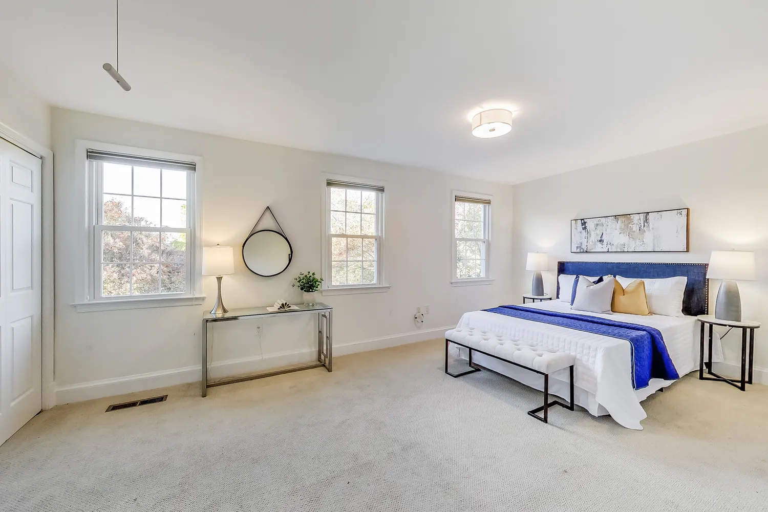 a bed room with a bed and a window