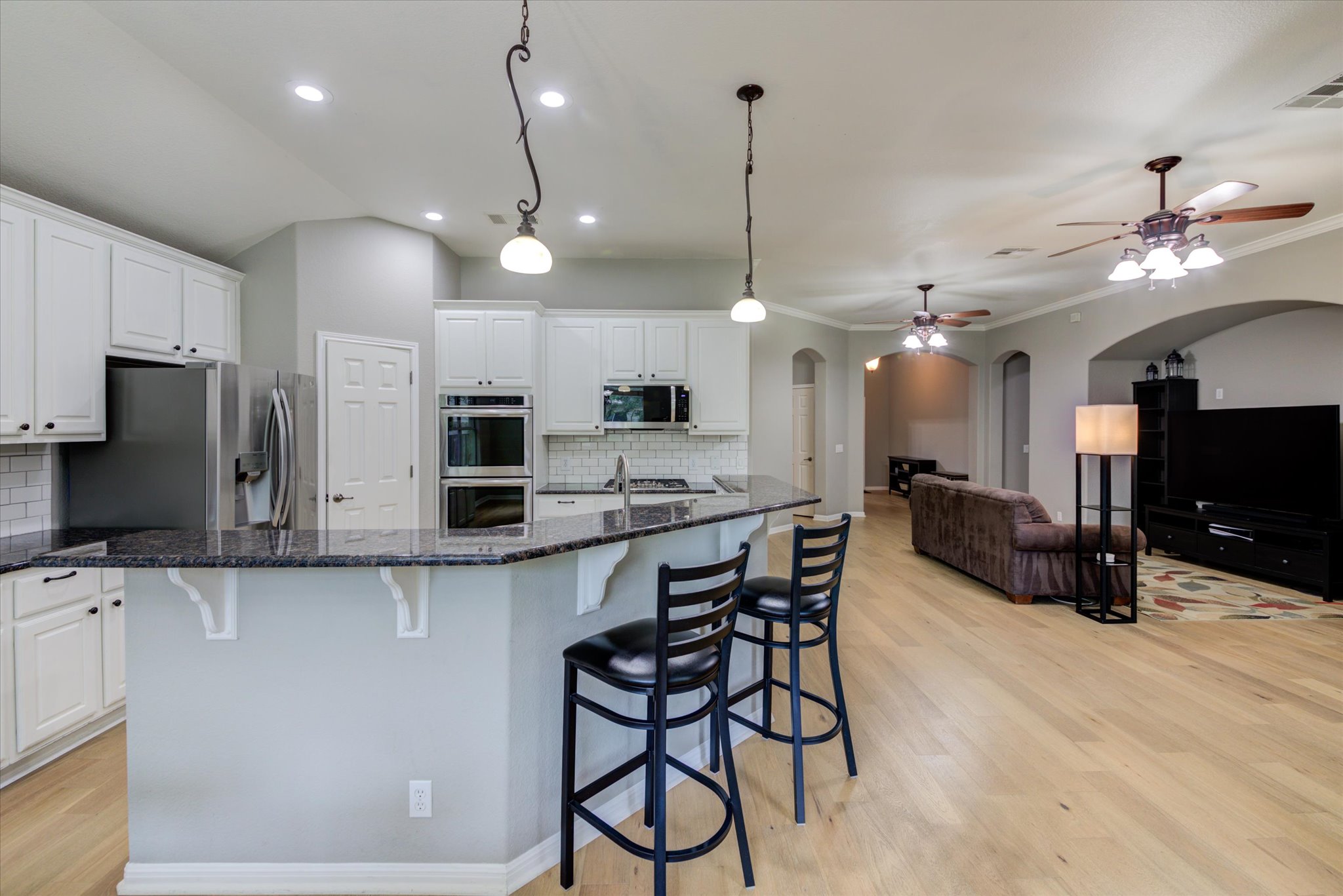 5412 Batak Lane Austin, TX 78749 - Photo 11 of 40 a large kitchen with a table and chairs