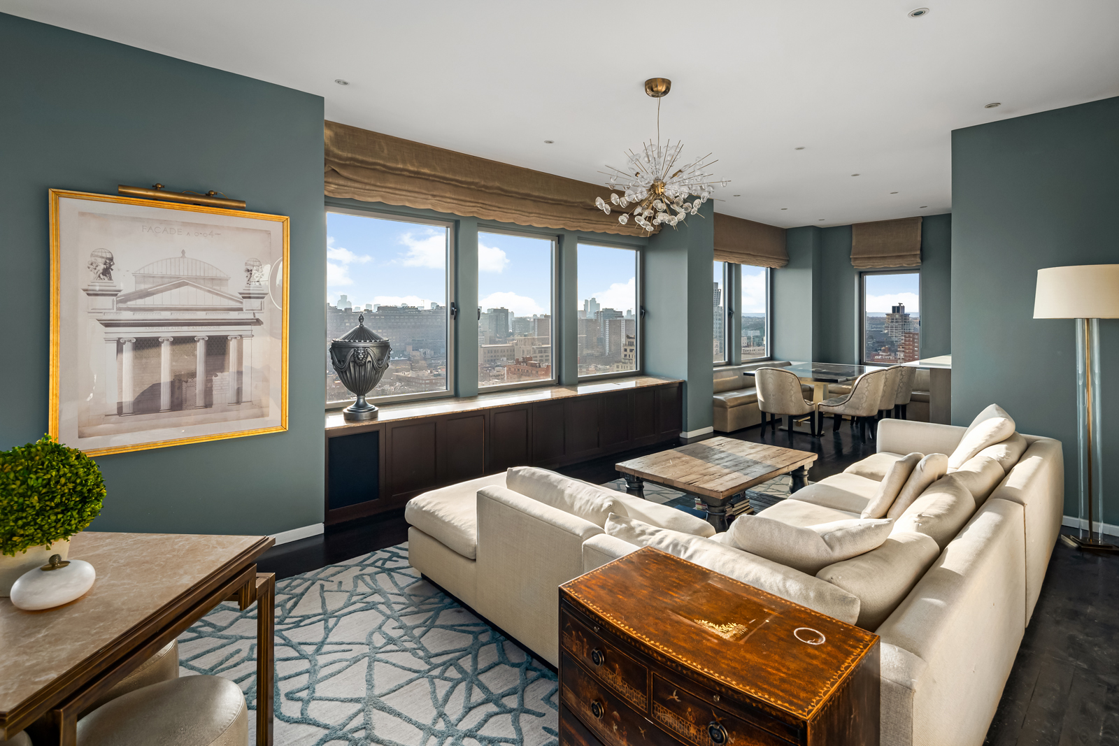 252 7th Avenue, Unit PHD Manhattan, NY 10001 - Photo 19 of 26 a living room with furniture and a large window