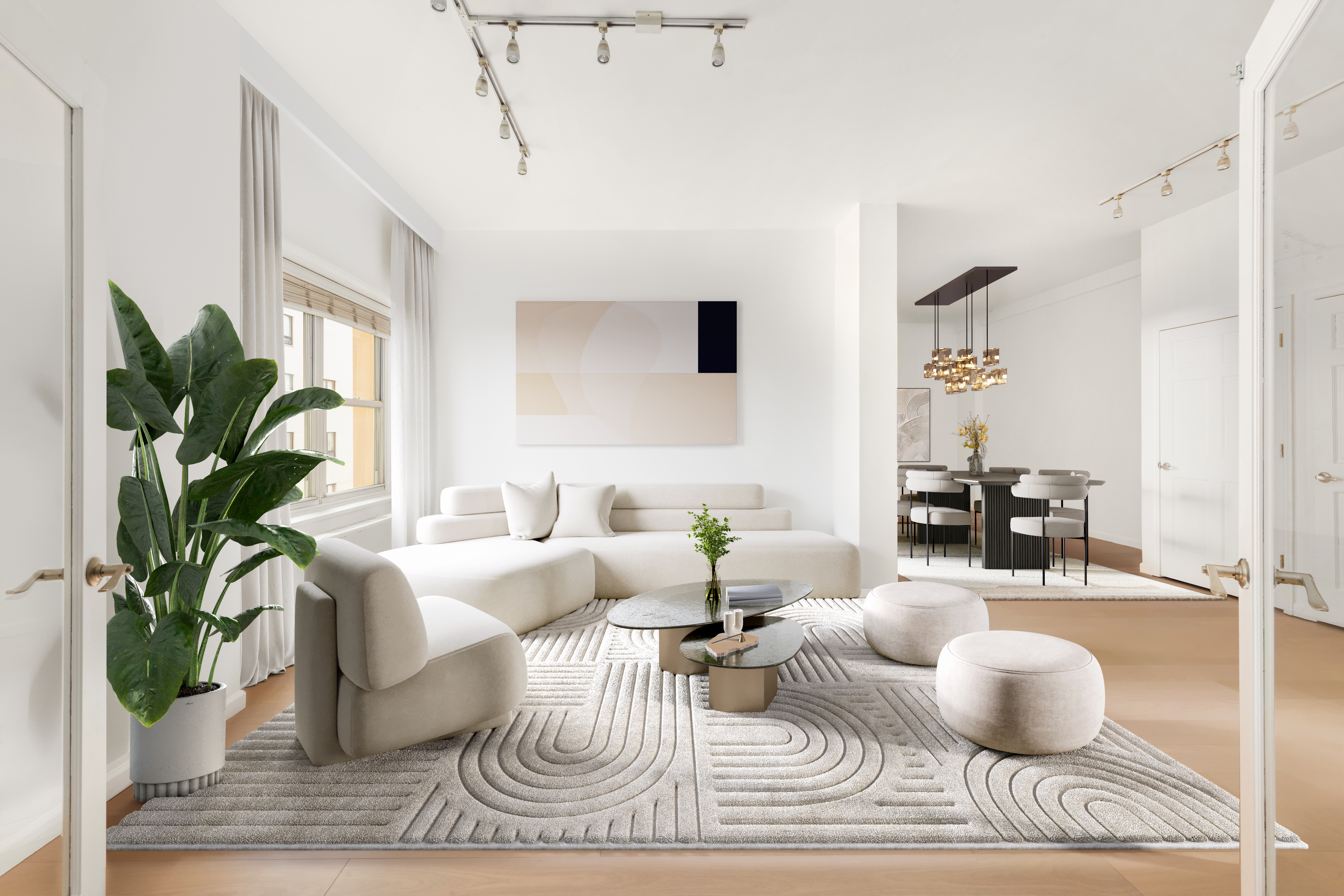 a living room with furniture and a potted plant