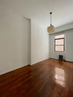 a view of empty room with windows