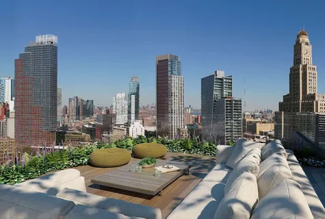 a view of a city with tall buildings