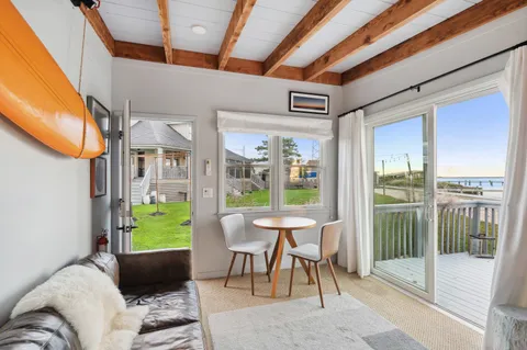 a kitchen with granite countertop a sink stainless steel appliances and cabinets