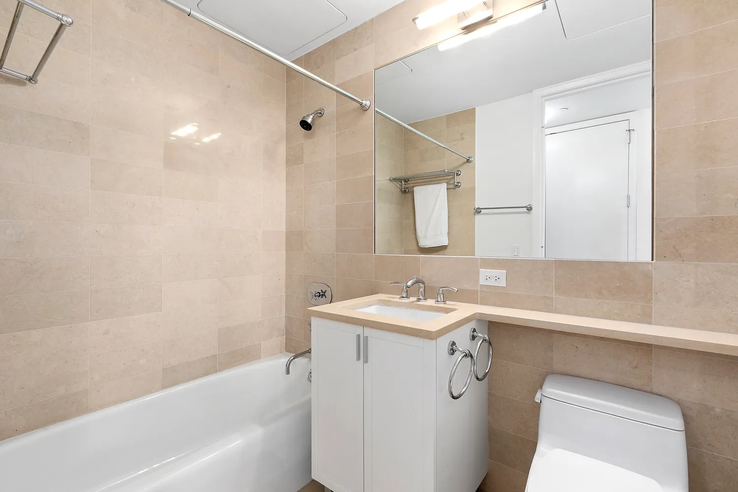 a bathroom with a sink a toilet and a bathtub