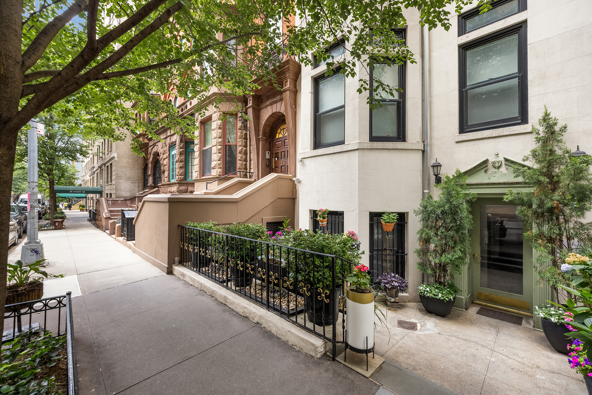27 West 82nd Street, Unit 2B Manhattan, NY 10024 - Photo 10 of 11 front view of a house with a yard
