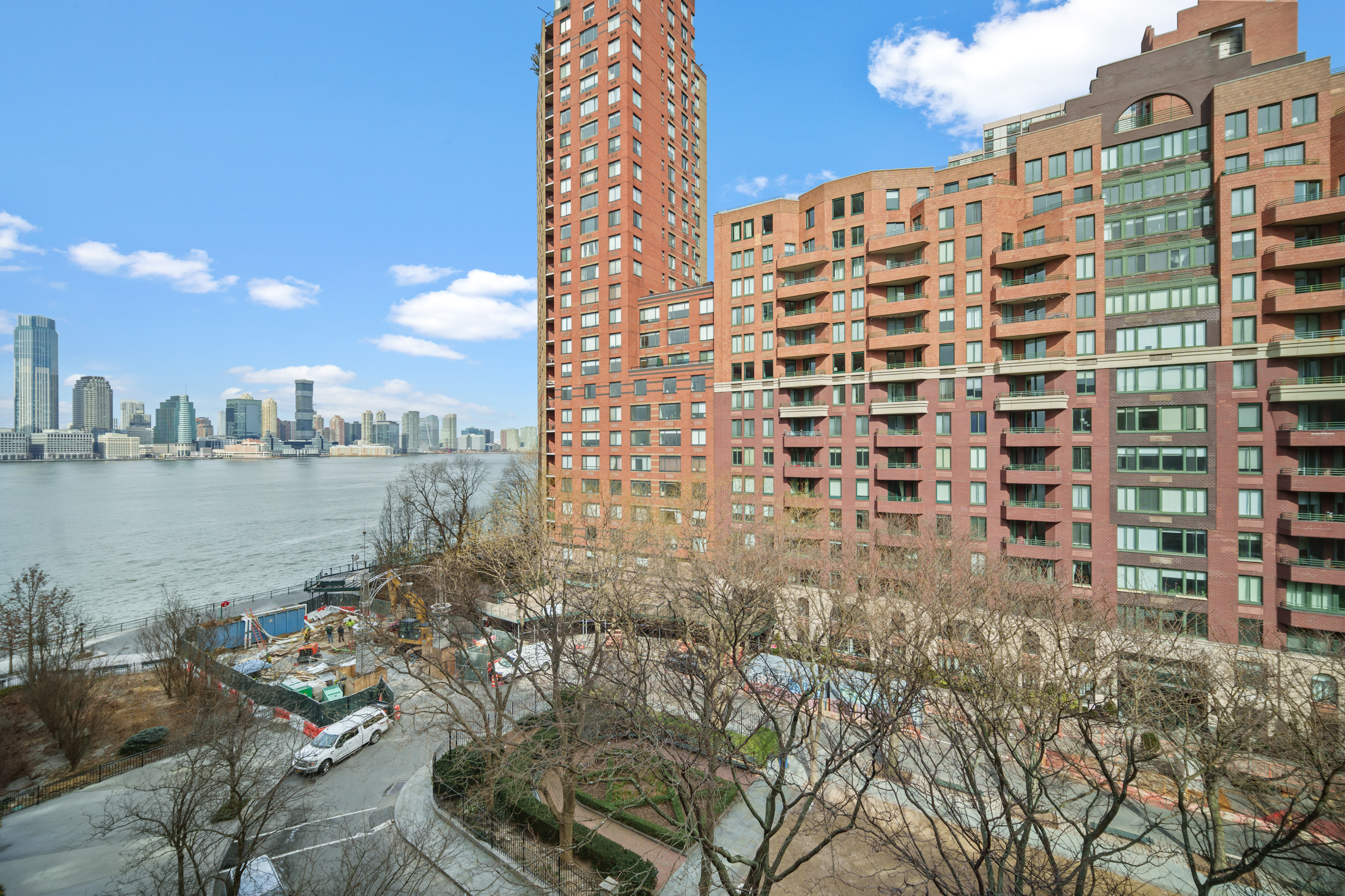 300 Rector Place, Unit 7F Manhattan, NY 10280 - Photo 5 of 10 a view of a city with tall buildings